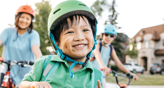 boy-riding-bike-560x300.jpg