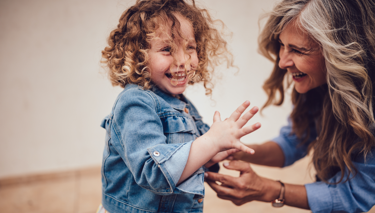 grandmother-grand-daughter-smiling-1200x683.png