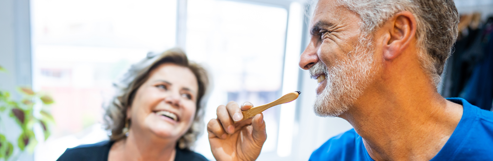 Older-man-brushing-teeth-1600x522.png