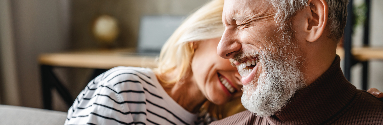 older-couple-laughing-1600x522.jpg