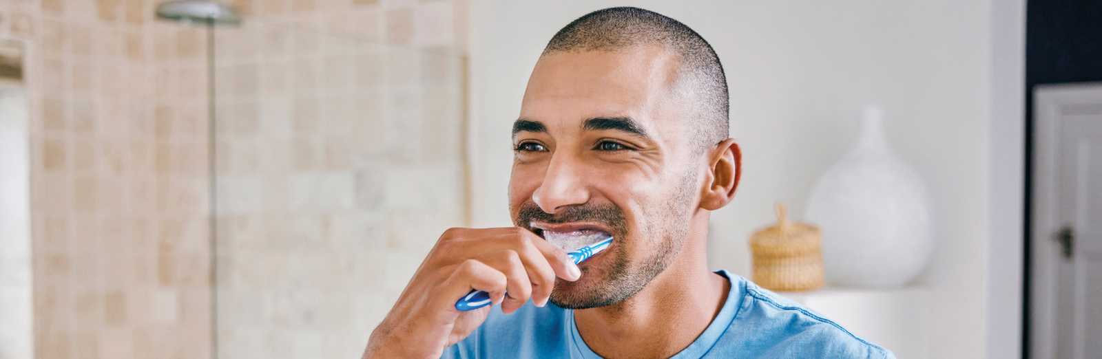 man-brushing-teeth-1600x522.jpg