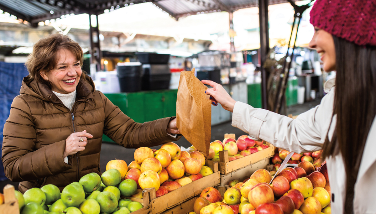 woman-shopping-at-farmers-market-1200x683.jpg