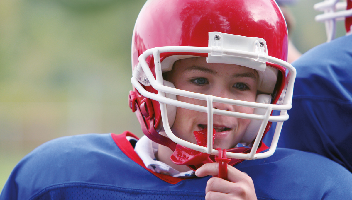 young-man-playing-football-1200x683.jpg