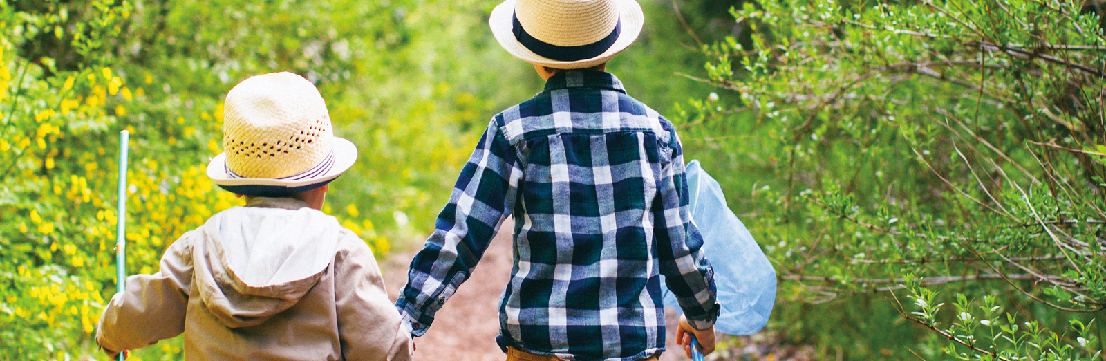 young-boys-holding-hands-1600x522.png