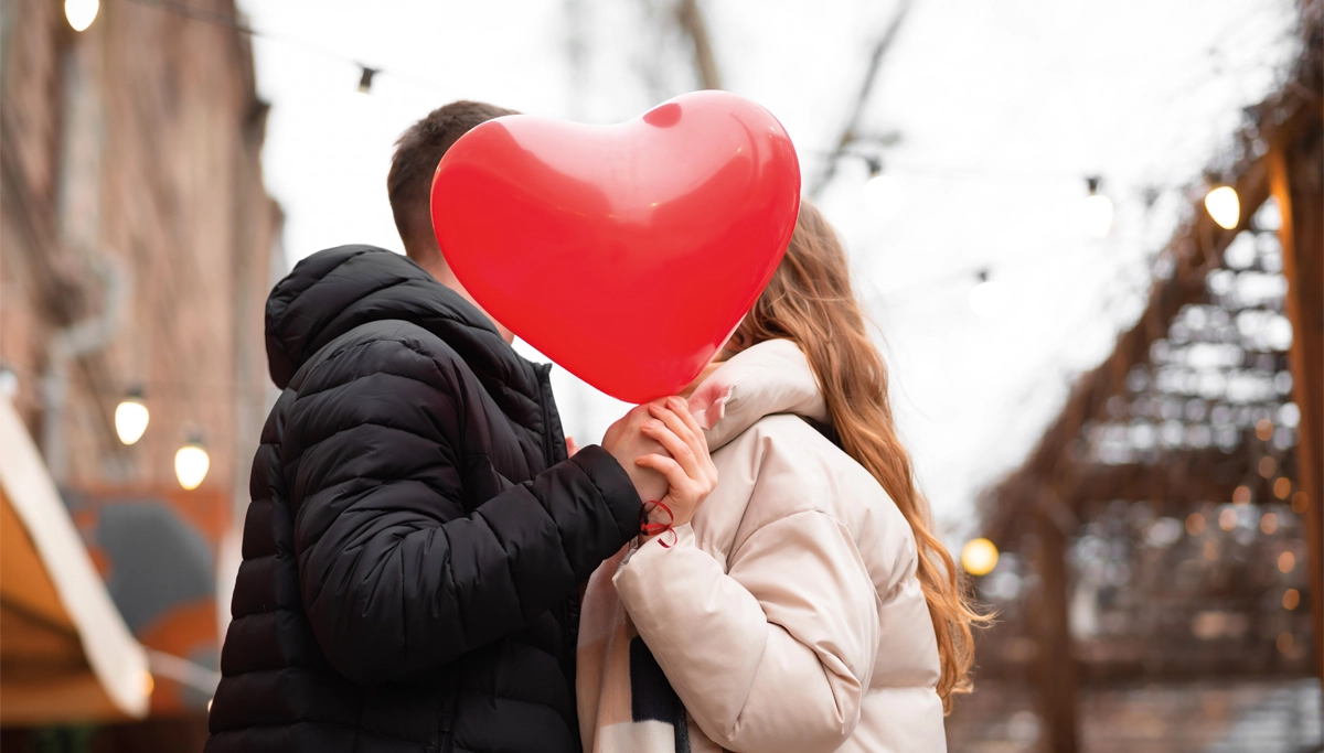 couple-with-heart-shaped-balloon-1200x6831.webp