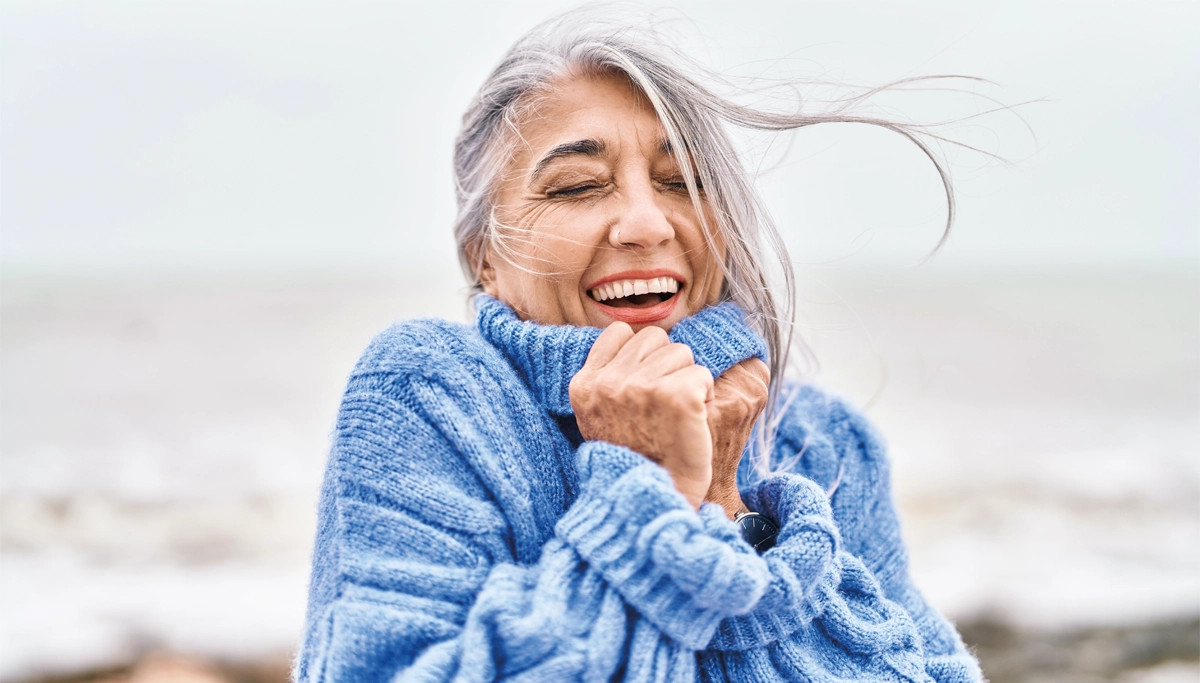 woman-smiling-outdoors-1200x683.webp