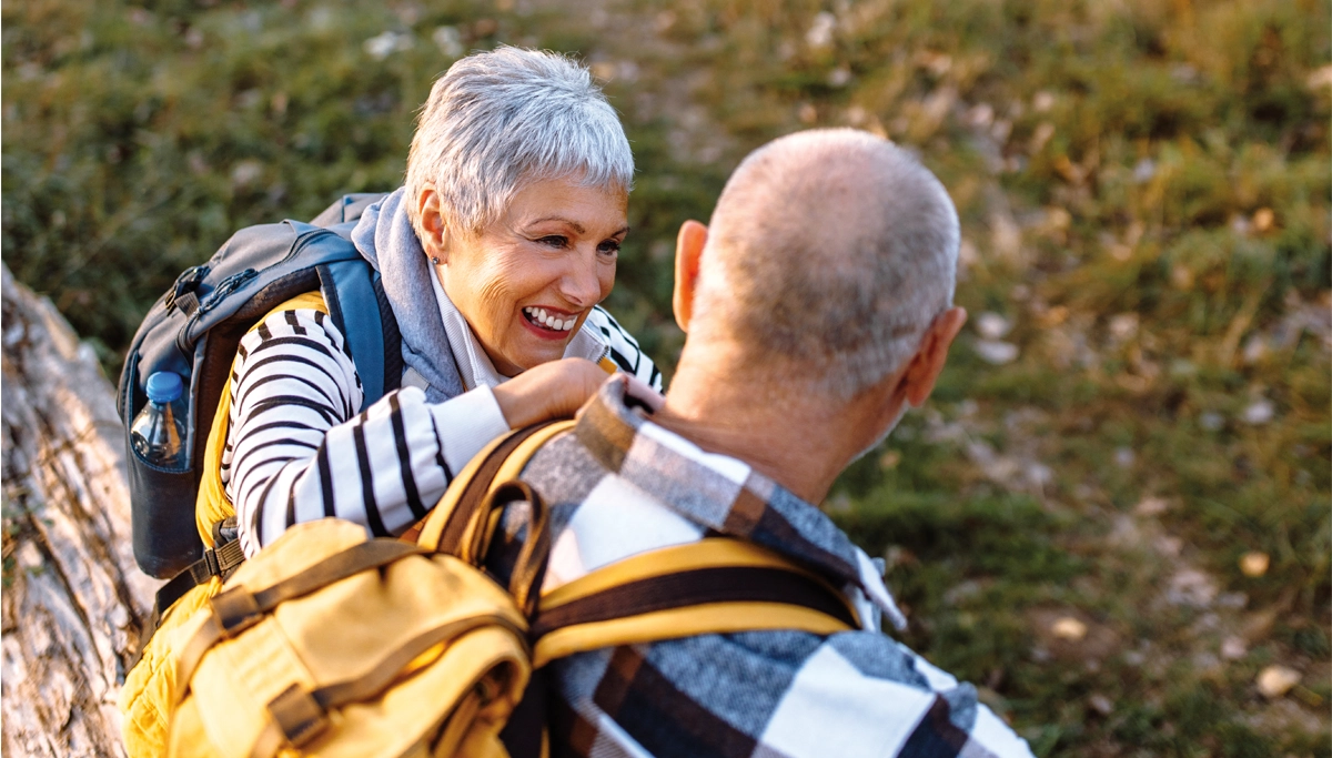 older-couple-laughing-outside-1200x683.webp