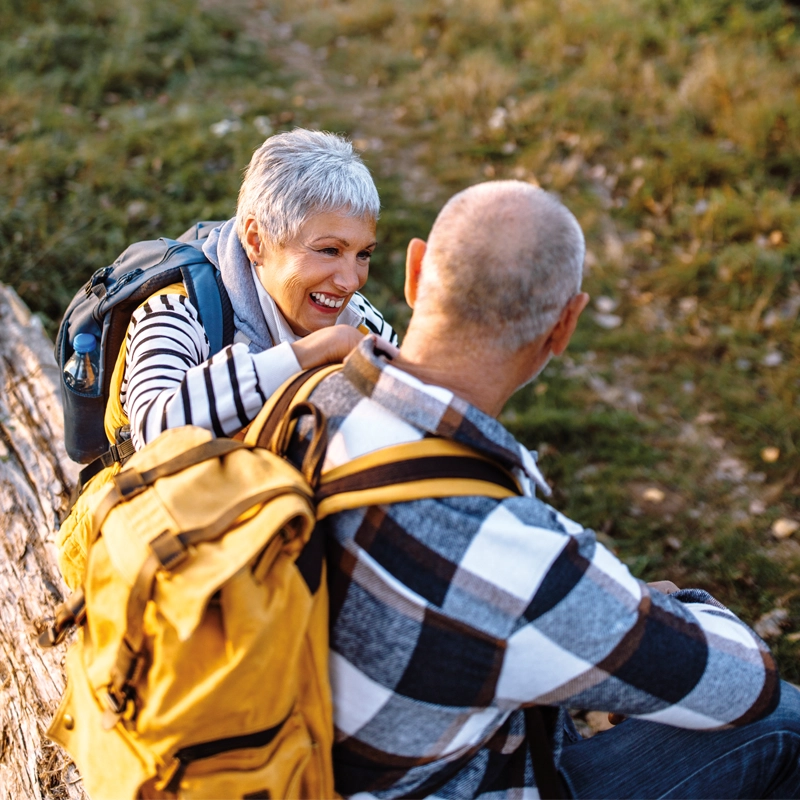 older-couple-laughing-outside-800x800.webp