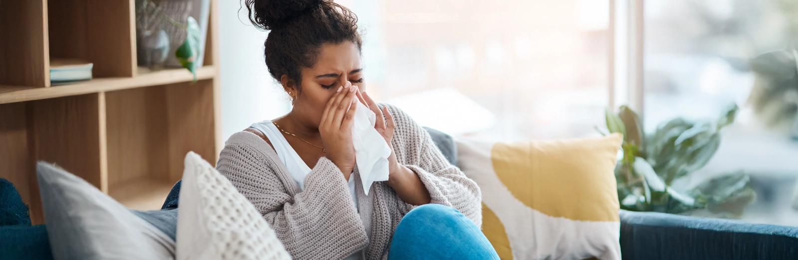 woman-using-a-tissue-1600x522.webp