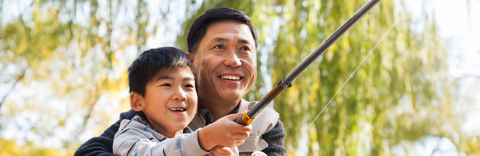 father-and-son-fishing-1600x522.webp