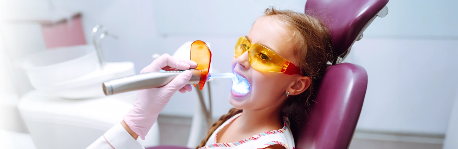 young-girl-getting-dental-work-done-1600x522.webp