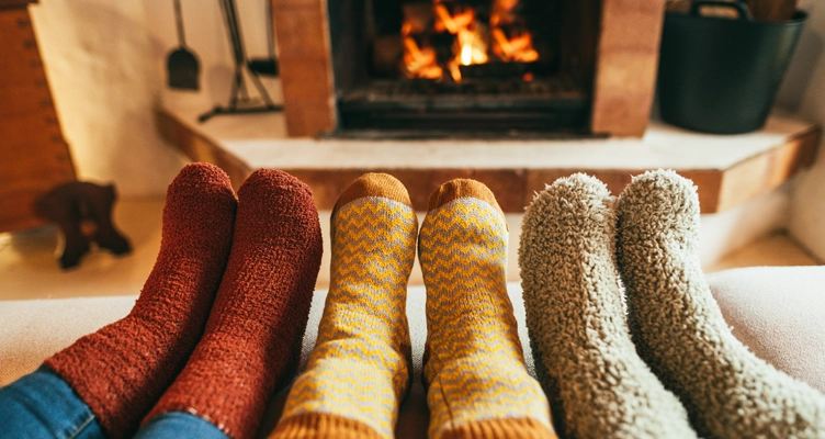 warm-socks-by-a-fireplace-752x400.webp