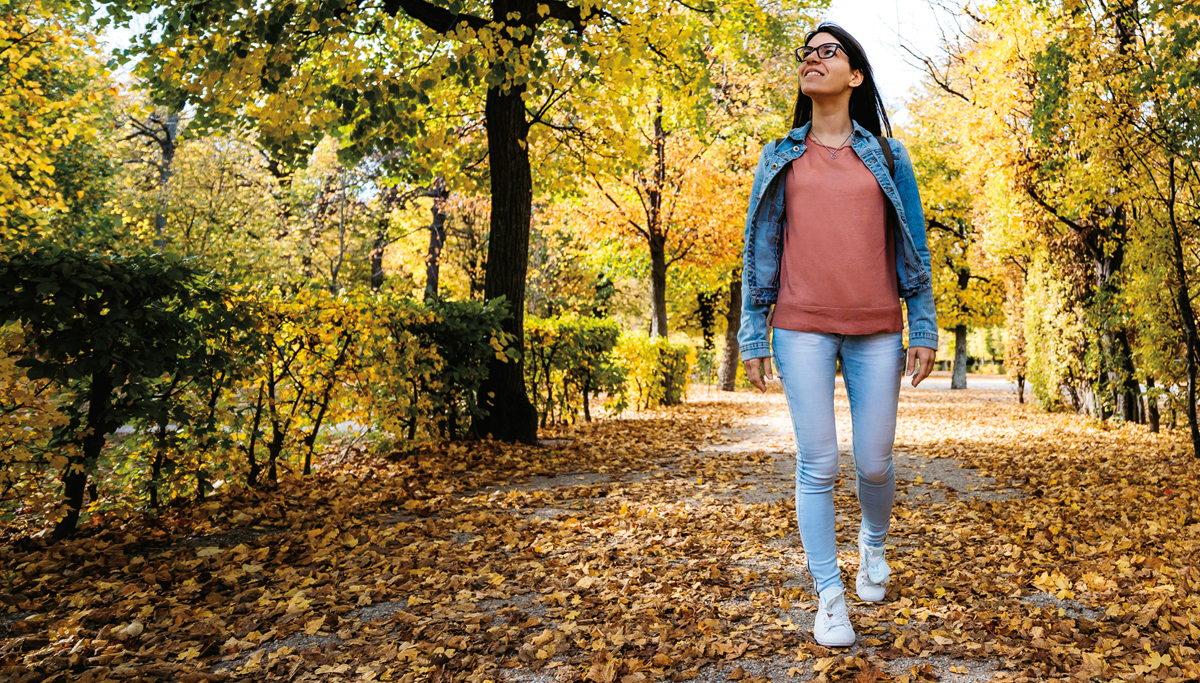 girl-walking-in-leaves-1200x683_flipped.jpg