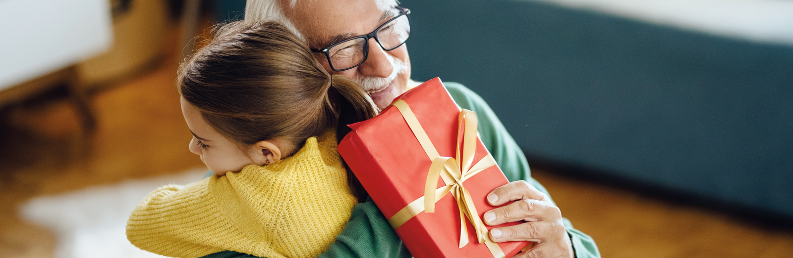 grandfather-with-gift-1600x522.jpg