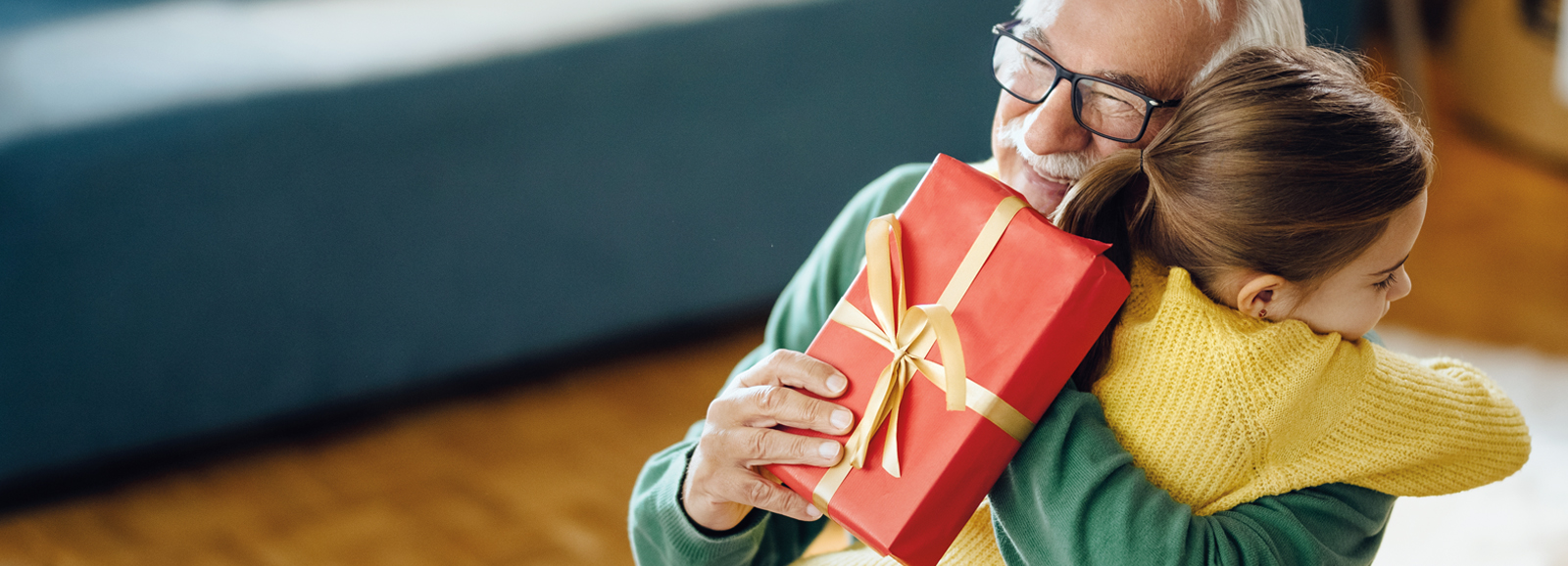 grandfather-with-gift-1600x578.jpg